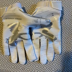 Under Armour youth size medium football gloves